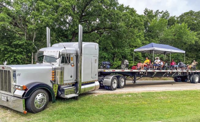 Debo Nealey’s 18-wheeler allowed for plenty of room for those on the float, and shade to boot!