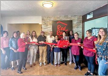 The Madison County Chamber of Commerce hosted a ribbon cutting ceremony for Red Roof Inn Tuesday, Sept. 19. Local community members along with city and chamber representatives were present to welcome Red Roof to the community. Red Roof Inn is located at 203 I-45 North in Madisonville. METEOR PHOTO BY RICHARD SIRMAN