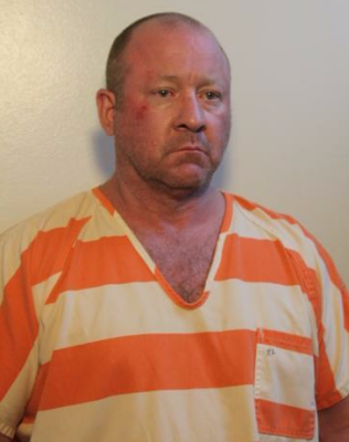 Man arrested after tire-less trek