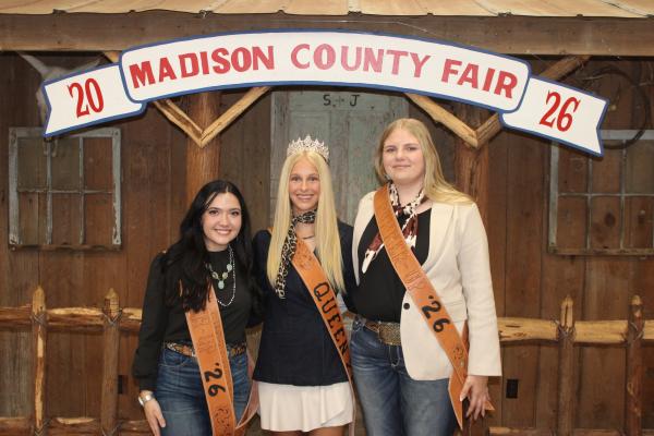 Sierra Brockman (center) in her sash and crown after being named the 2026 Madison County Fair Queen, joined by first and second runner-ups Audrie Busa (right) and Madison McClure (left), respectively. McClure also earned the Miss Photogenic title. METEOR PHOTO BY RICHARD SIRMAN