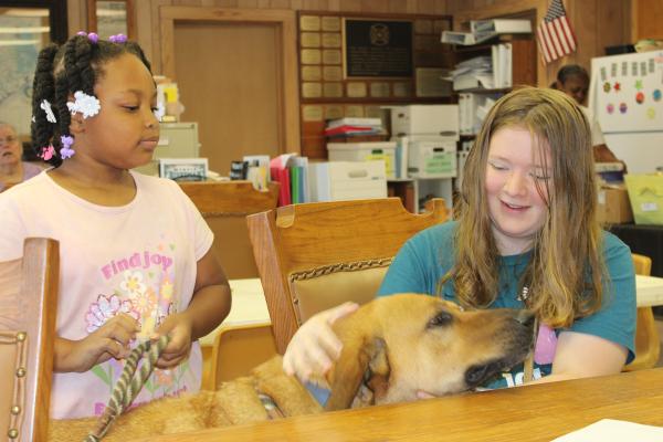 READING, COLORING AND A FRIENDLY DOG AT MIDWAY SUMMER KICKOFF