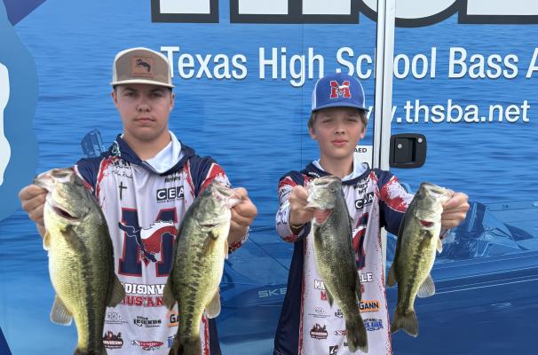 PHOTO COURTESY OF SABRINA BOYD Kaiden Rowley (left) and Cody Lawrenz with their catches at a Texas High School Bass Association weigh-in.
