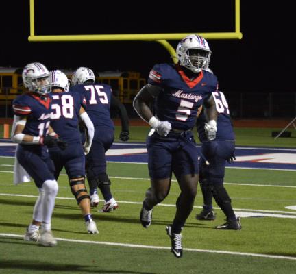 Madisonville senior running back Jaden Simpson celebrates after one of his five touchdowns against Bellville at Mustang Stadium on Senior Night Friday. Simpson's remarkable senior campaign has now resulted in 27 total touchdowns with one regular season game remaining. METEOR PHOTOS BY CAMPBELL ATKINS