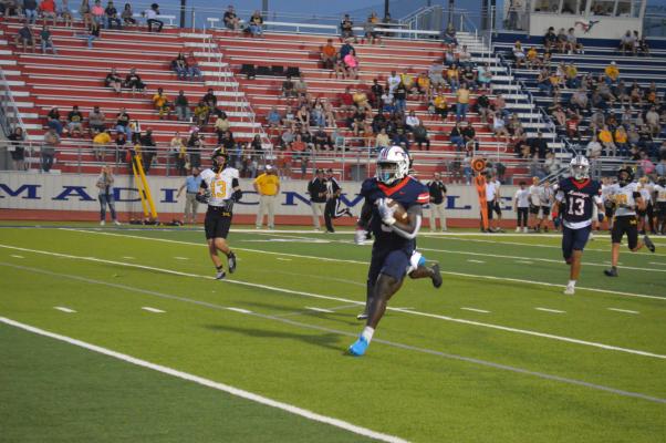 Mustangs Tame Tigers in Home Opener
