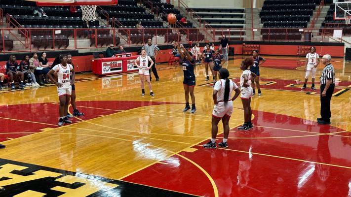 The Lady Mustangs playing against the Rusk Eagles during their first district match of the season. COURTESY PHOTO