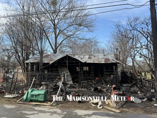 Fire destroys East Limit Street home