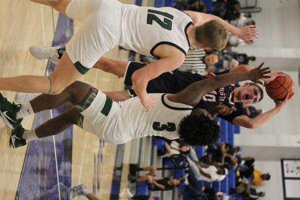 Madisonville sophomore, Ely Wiliams, scores on a post move during the Mustangs 63-40 win over Franklin at the Mike Dacus Classic in Navasota, Dec. 13. METEOR PHOTOS BY MATTHEW YBARRA