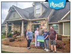 Keep Madison County Beautiful named Danny and Karen Wilkerson's residence as the Residence of the Month on Wednesday, May 1. Pictured from left to right are Crystal Callaham, Karen Wilkerson, Danny Wilkerson, Kay Welch, and Derek Wiggins, representatives from the organization who presented the award to the Wilkersons in recognition of their beautifully maintained property. COURTESY PHOTO