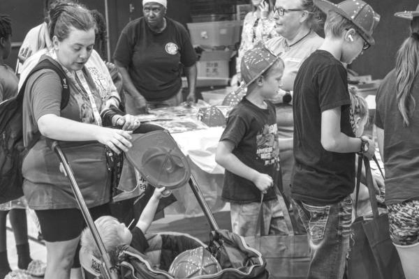 STUDENTS STOCK UP AT BACKTO- SCHOOL SUPPLY GIVEAWAY