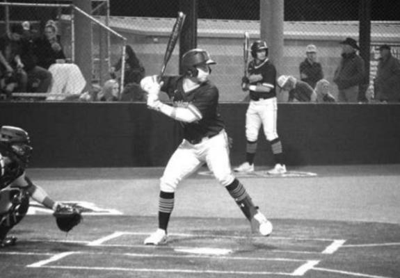 Madisonville’s Brad Rudis awaits a pitch against Elkhart March 2, which he would drive down the third base line to help propel the Mustangs to a 3-0 win at home in a standalone, non-district matchup. CAMPBELL ATKINS