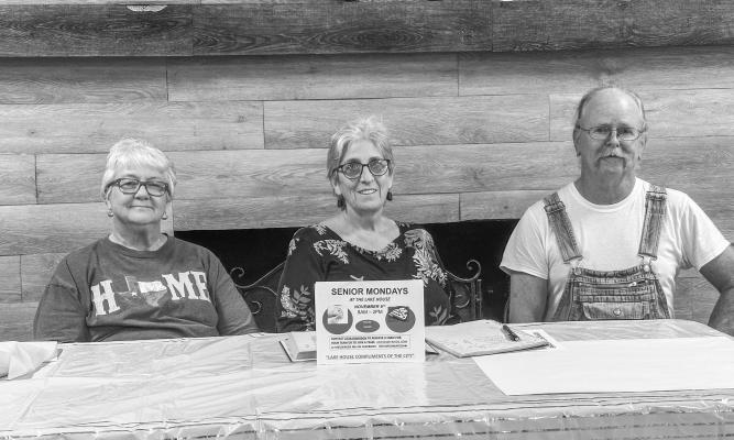 From left to right, Cindy Clark, Antoinette McCormick, and Don Wright at Senior Monday hosted at Lake House at Lake Madison Park. Senior Mondays welcome individuals aged 40 and up to the Lake House each Monday from 8 a.m. to 2. p.m. for some board games, cards and a good time. METEOR PHOTO BY RICHARD SIRMAN