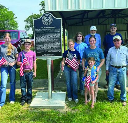 U.S. Flags placed at graves of deceased Military at Ten Mile Cemetery in Madison County