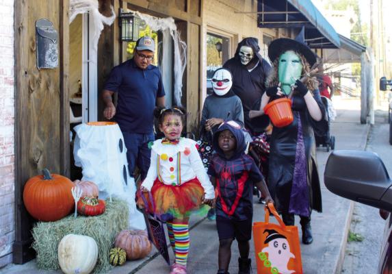 TREATS FILL DOWNTOWN STREETS