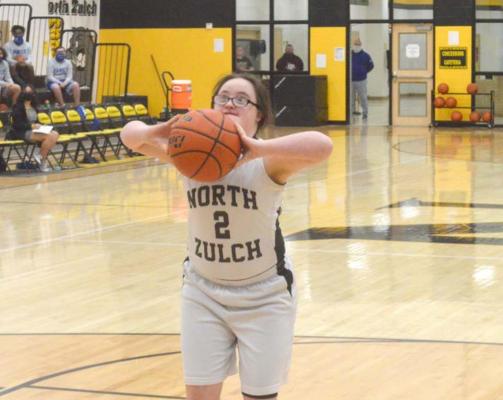 Avery O’Neal of North Zulch shoots a free throw at NZISD Friday as part of the basketball program’s Shoot-athon fundraiser. CAMPBELL ATKINS