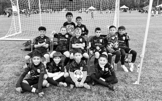 FC Mustangs Soccer Club 2017 JRs compete in tournament play. The team finished as runner-up after beating Houston clubs and reaching the championship game against Rayados academy from Monterrey, Mexico. COURTESY PHOTOS