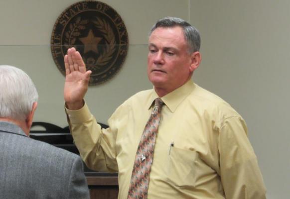 Newly elected Madison County Sheriff Bobby Adams takes his oath of office at the Madison County Courthouse Friday. CAMPBELL ATKINS