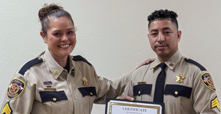 Sgt. Calica Kampf congratulates newly promoted Patrol Sgt. John David Harris.