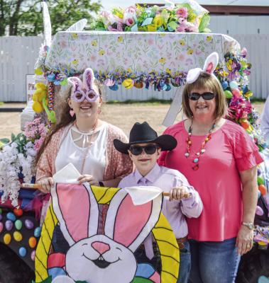 From left to right, the team of Georgia Shiver, one-year-old, Delaney Callaham, 18 years old, and Dillon Callaham, seven years old, with Crystal Callaham at Rita’s Easter Parade on Saturday, March 30. Their parade entry won best overall. METEOR PHOTO BY RICHARD SIRMAN