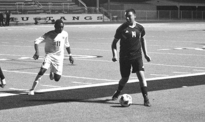 MadVille M Soccer pic: Madisonville’s Juan Torres handles the ball during a home game at MHS. CAMPBELL