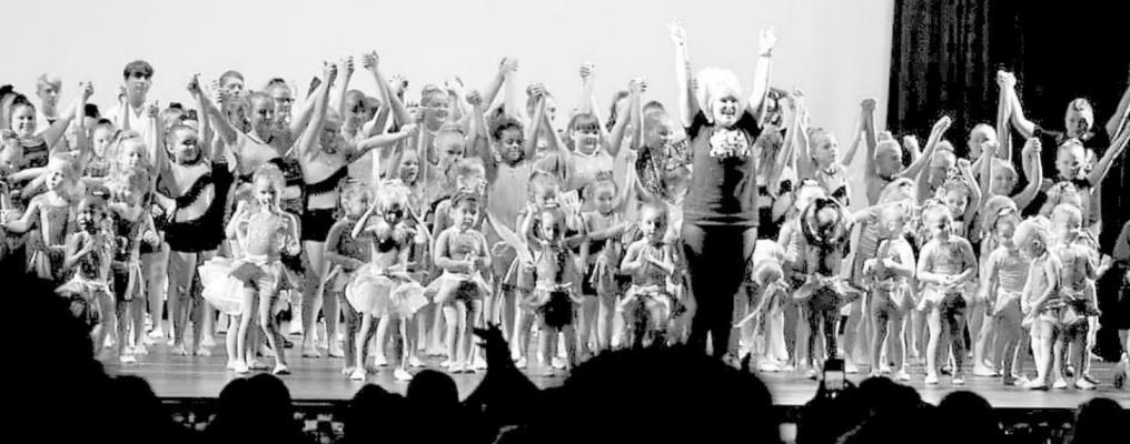 Performers from Lori’s School of Dance, Tumbling and Cheerleading pose together at the MHS auditorium Saturday. COURTESY PHOTO