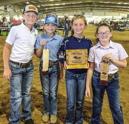 Madison County Junior Livestock Judging Team which consists of Ky Davis, Paisley Long, Owen Rouse, and Harper Rouse.