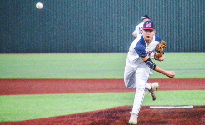 Rayce Hudson delivers a pitch at MHS. CAMPBELL ATKINS