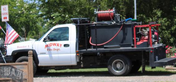 The Midway Fire Department showcasing their vehicles.