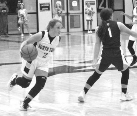 Katelyn Crocker drives to the basket during the Lady Bulldogs’ 68-56 home loss against Fayetteville Friday. Crocker led the team in scoring with 22 points. CAMPBELL ATKINS