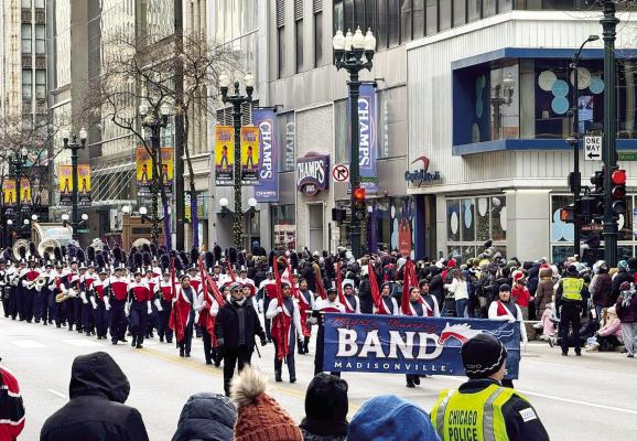 The Madisonville High School Mustang marching band joins the Chicago Thanksgiving Day Parade Thursday, Nov. 28, performing for a crowd of thousands lined down State Street. The drumline, horns and color guard represented Madisonville in the Windy City’s mile-long procession as one of 190 groups chosen for the nationally televised celebration. PHOTO COURTESY OF JOSE NACIANCENO
