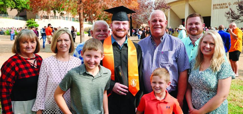Firefighter beats odds and walks across the graduation stage at SHSU