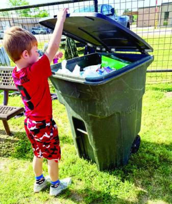 FIRST- GRADERS CELEBRATE EARTH DAY