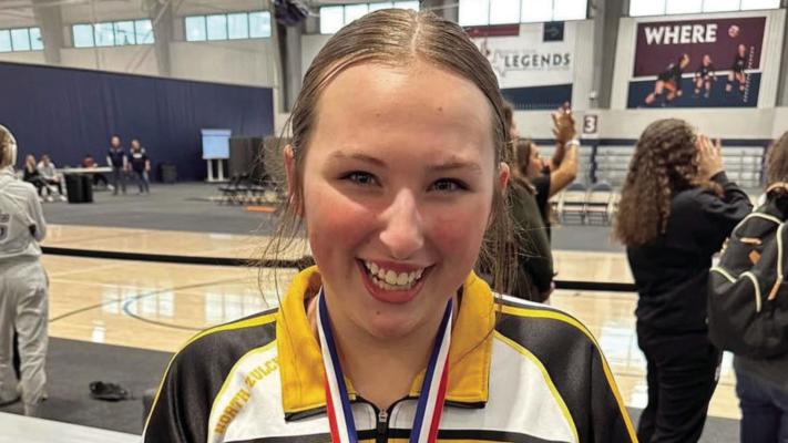 North Zulch High School freshman Zailey Crocker displays her UIL 5A-Region 3-District 10 Girls Most Outstanding Wrestler award. Crocker, competing in the 163-pound weight class, won the district championship before advancing to place seventh at regionals.