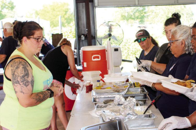 A COMMUNITY FILLS THE FIREHOUSE