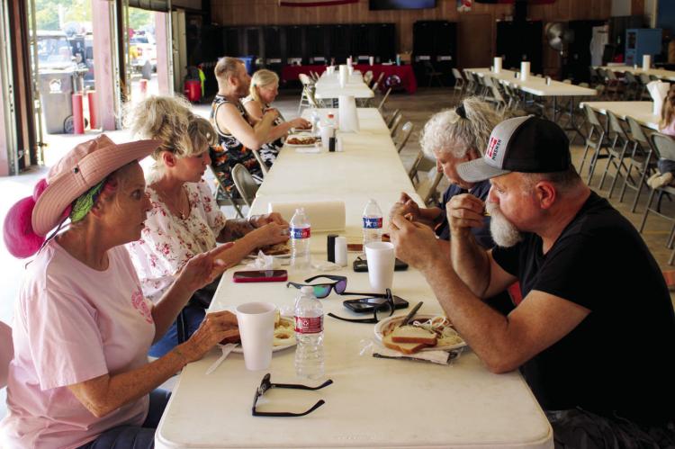 A COMMUNITY FILLS THE FIREHOUSE