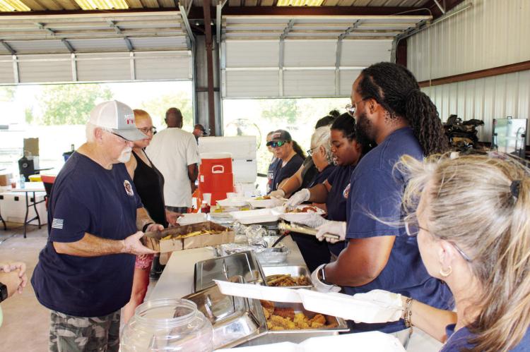 A COMMUNITY FILLS THE FIREHOUSE