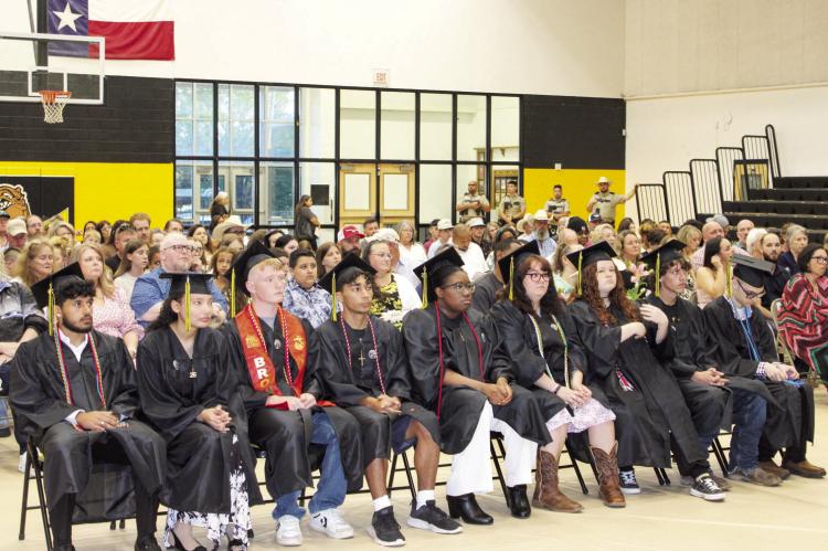 A CLASS MOVES FORWARD, TOGETHER