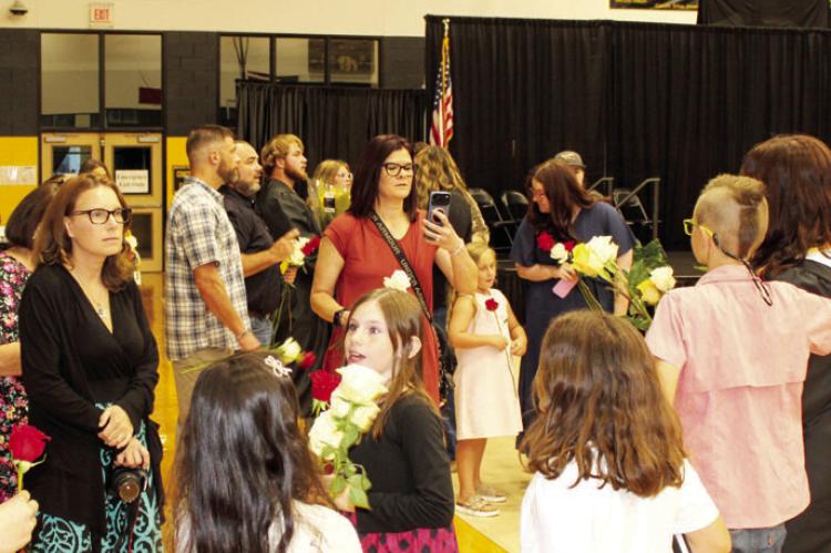 A CLASS MOVES FORWARD, TOGETHER