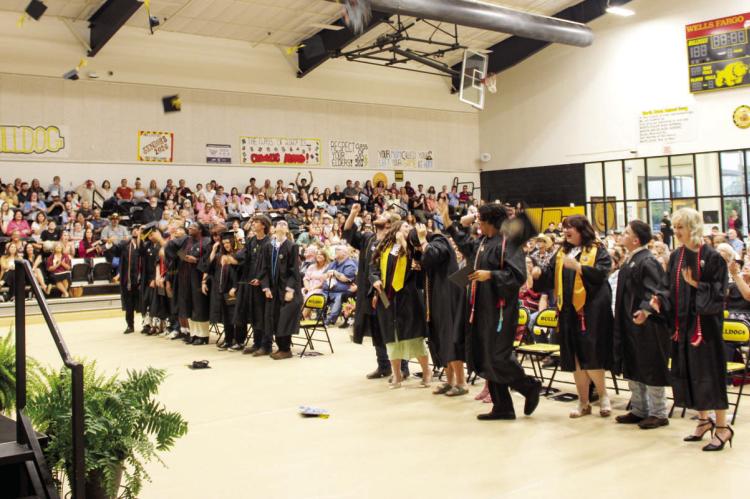 A CLASS MOVES FORWARD, TOGETHER