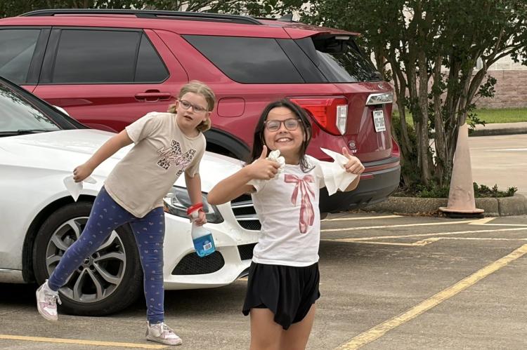 MIS STUDENT COUNCIL CLEANS WINDOWS FOR TEACHERS
