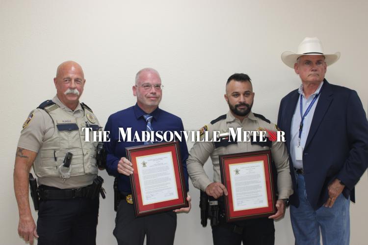 From left, Curtis Klingle, Walter Dyches, Koray Elkat and Bobby Adams stand together after the ceremony.
