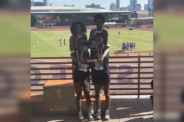 The Madisonville Lady Mustangs 4x100 meter relay team poses with their bronze medals at Mike A. Myers Stadium in Austin after finishing third at the UIL Class 4A State Track and Field Championships May 14. The team of Stacia Mark, Stephanie Edwards, Teilani Lain and Cedaja Ford ran a 46.66. COURTESY PHOTO BY BRAD TAYLOR