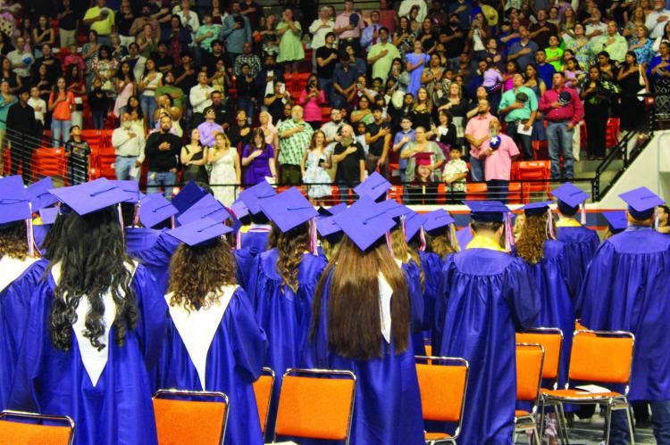 143 MUSTANGS WALK THE STAGE