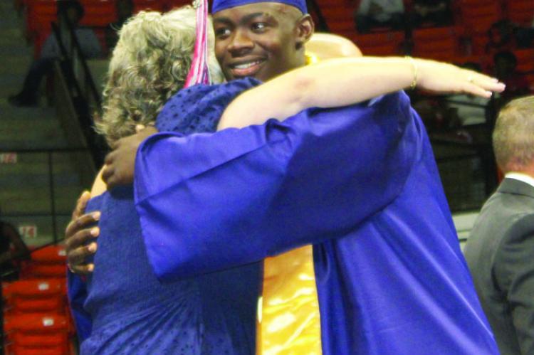 143 MUSTANGS WALK THE STAGE