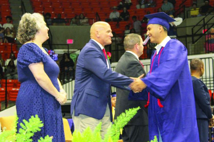 143 MUSTANGS WALK THE STAGE