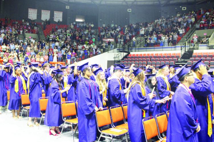 143 MUSTANGS WALK THE STAGE